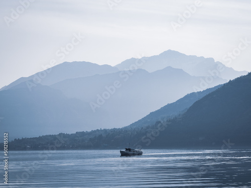 boat on the lake in the morning mist