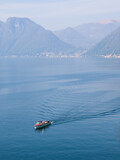 classic wooden motorboat on the lake como