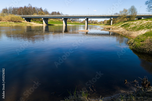 Bridge over Venta river in sunny spring day, Skrunda, Latvia.
