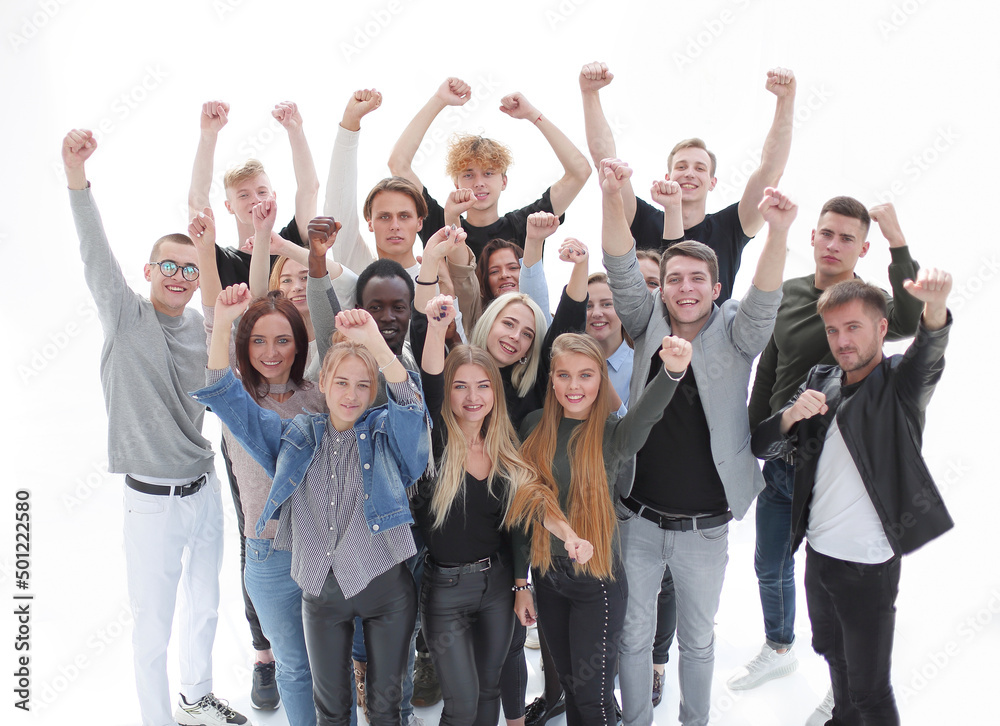 large group of happy young people with hands up