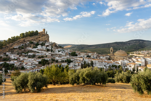 Panoramic view of Montefrio since National Geographic lookout with olive trees in the foreground at sunset. Granada, Andalucia, Spain.