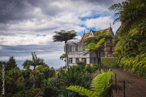 Panoramic view of Monte tropical garden with exotic vegetation surrounding the pond in Madeira island in Portugal. Long exposure picture. October 2021