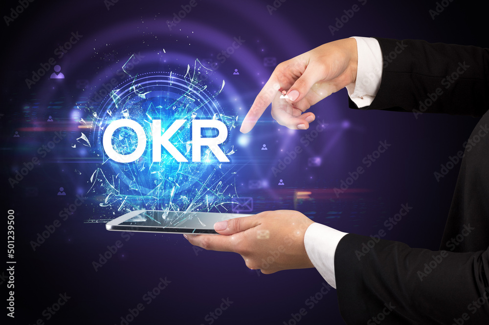 Close-up of a touchscreen with abbreviation. Close-up of a touchscreen with abbreviation.