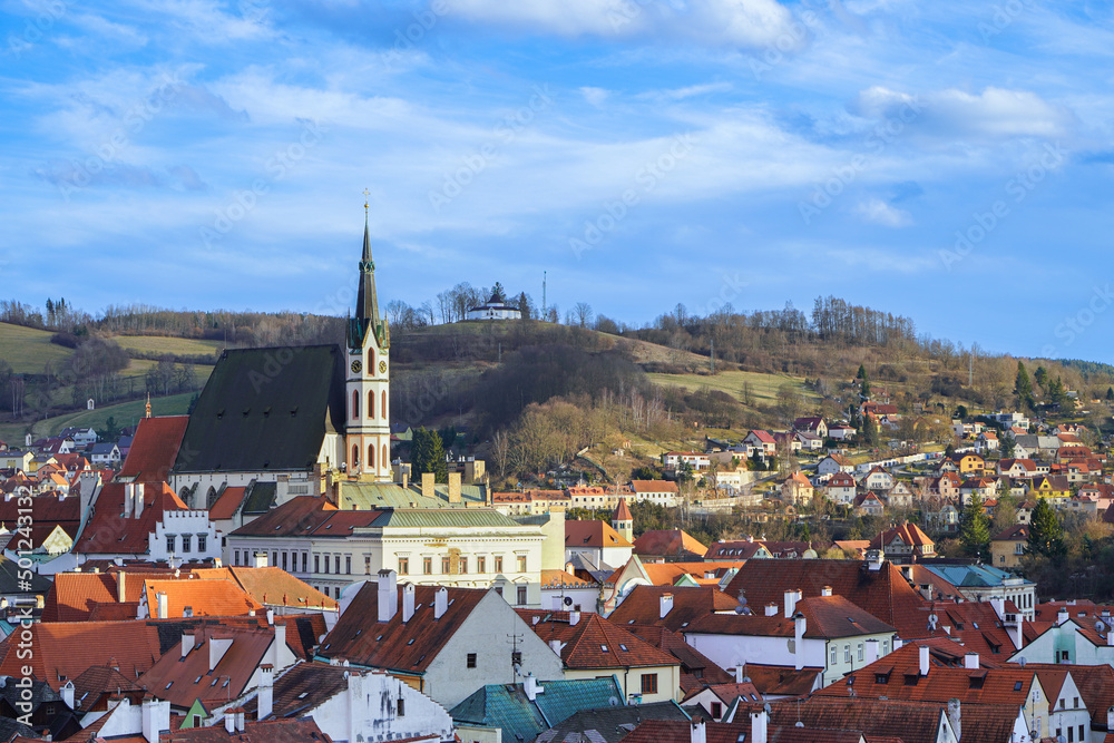 Cityscape of east europe with summer nature. Old town with hill and blue sky on the background.