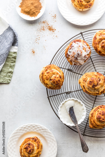 Freshly made cinnamon bun rolls topped with cream cheese icing.