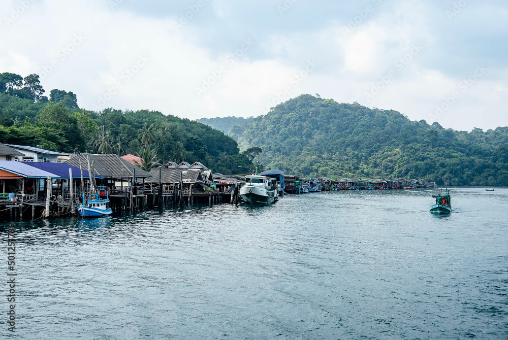 Fototapeta premium Folk fishing village in the sea Ban Ao Salad, Koh Kood, Trat Province, Thailand