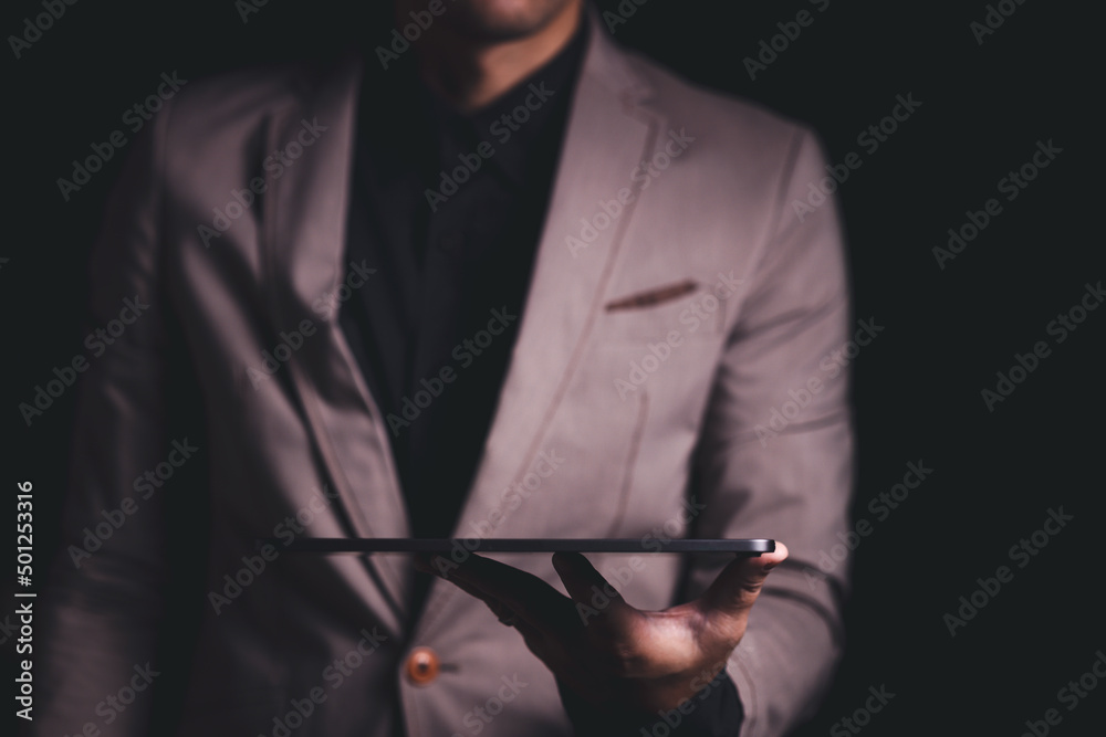 Close up hand of businessman with tablet. Concept of technoloy for business.