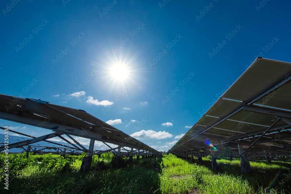Photovoltaic modules solar power plant on dramatic sunset sky ...