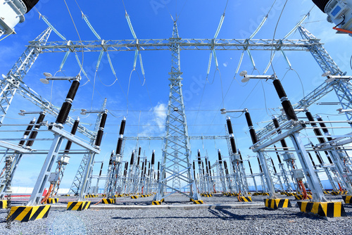 High voltage power transformer substation in solar power station to reduce global warming and climate change photo