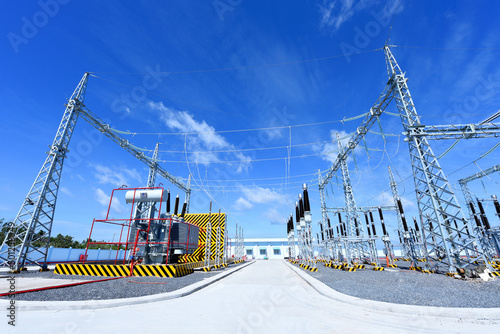 Fototapeta Naklejka Na Ścianę i Meble -  High voltage power transformer substation in solar power station to reduce global warming and climate change