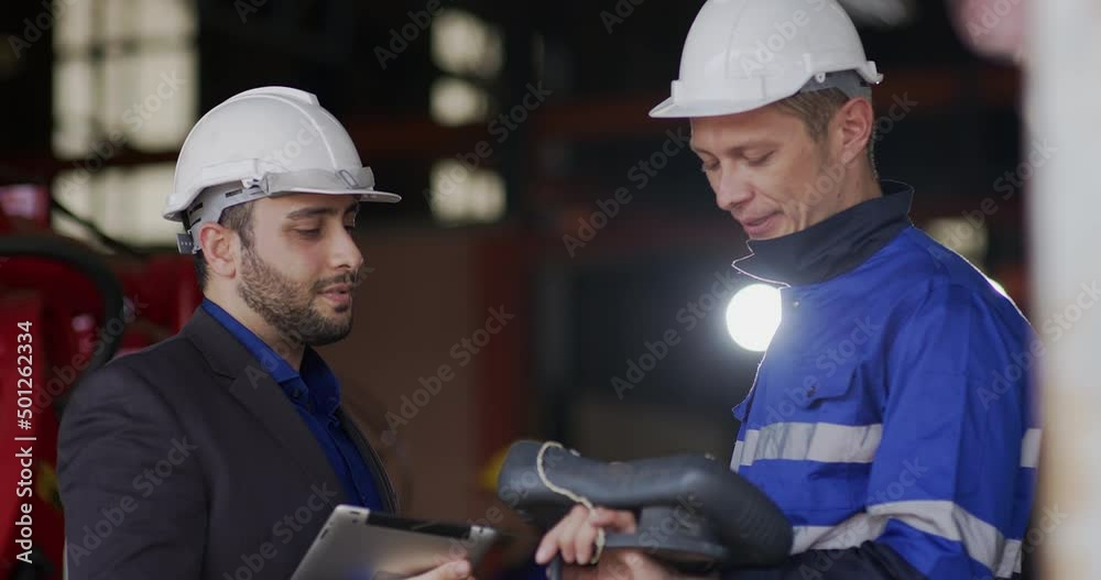 Diverse Team talking with Tablet Analyse and Discuss How a Futuristic Robotic Arm Works Robot arm Diverse Team talking with Tablet Analyse and Discuss How a Futuristic Robotic Arm Works Robot arm