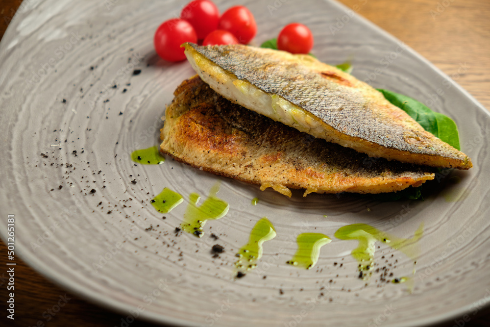 Fried fish fillet with tomatoes Fried fish fillet with tomatoes
