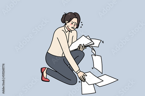 Unhappy businesswoman crying collect scattered on floor papers. Upset stressed clumsy woman gather dropped documents or paperwork, clean mess at workplace. Vector illustration. 