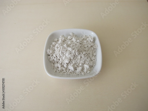 White slurry chalk powder for peeling or mask on a wooden board