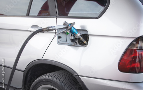 Car refuelling at the gas station.