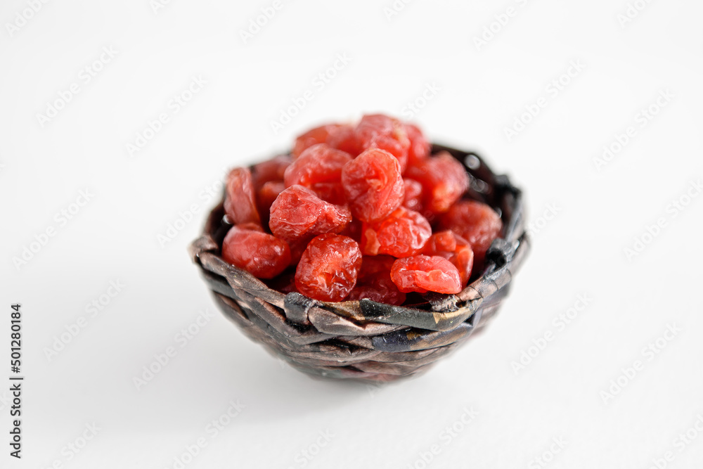 Dried berries in sugar on a white background. Dried berries in sugar on a white background.