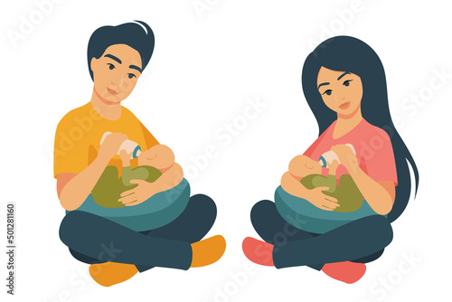A girl and a man feed babies from a bottle