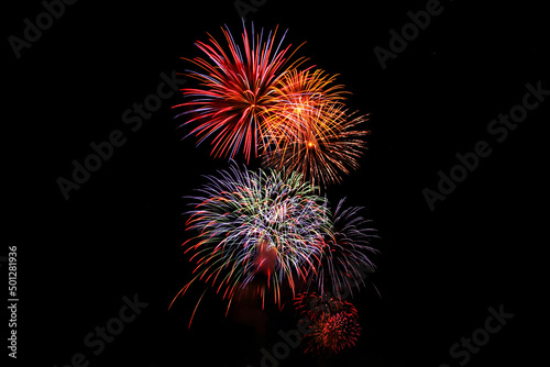 Colorful Fireworks in the night sky  celebration  color image  colors  exploding  firework display  illuminated  majestic  multi-colored  night  no people  outdoors  sky  spark  vertical  photography