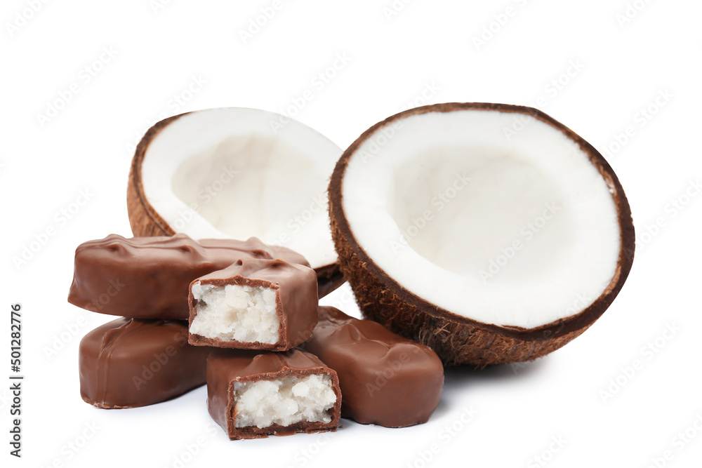 Delicious milk chocolate candy bars with coconut filling on white background Delicious milk chocolate candy bars with coconut filling on white background