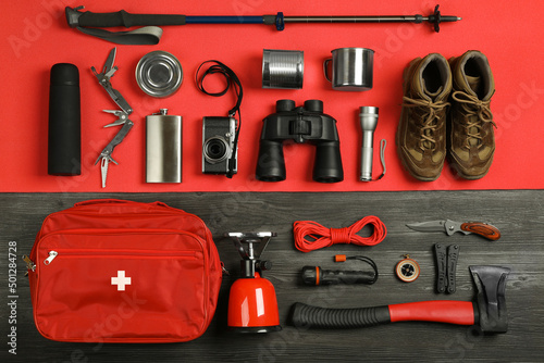 Canvas Flat lay composition with different camping equipment on color background