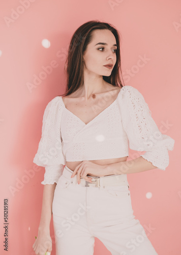 Woman model appearance on a pink background