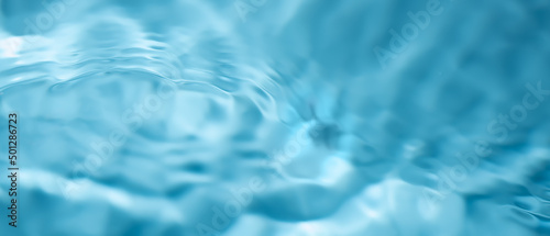 Blue waves blurred soft waves background. natural water gradient stripes