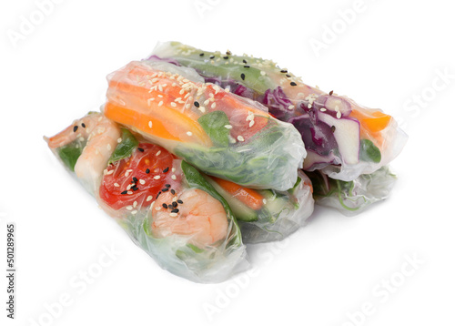Many different rolls wrapped in rice paper on white background