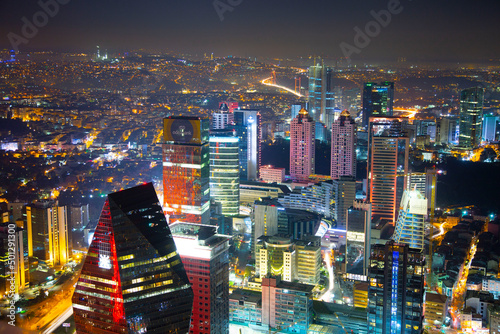 Photography Aerial night panoramic view of business Istanbul, Turkey