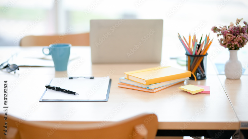 Office meeting table with stationery and decor Office meeting table with stationery and decor