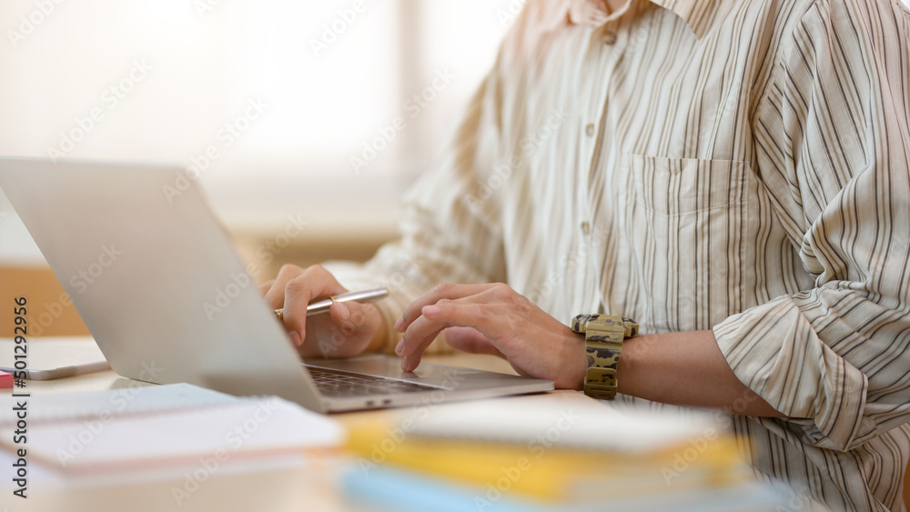 Cropped image, Businessman or male worker using laptop computer