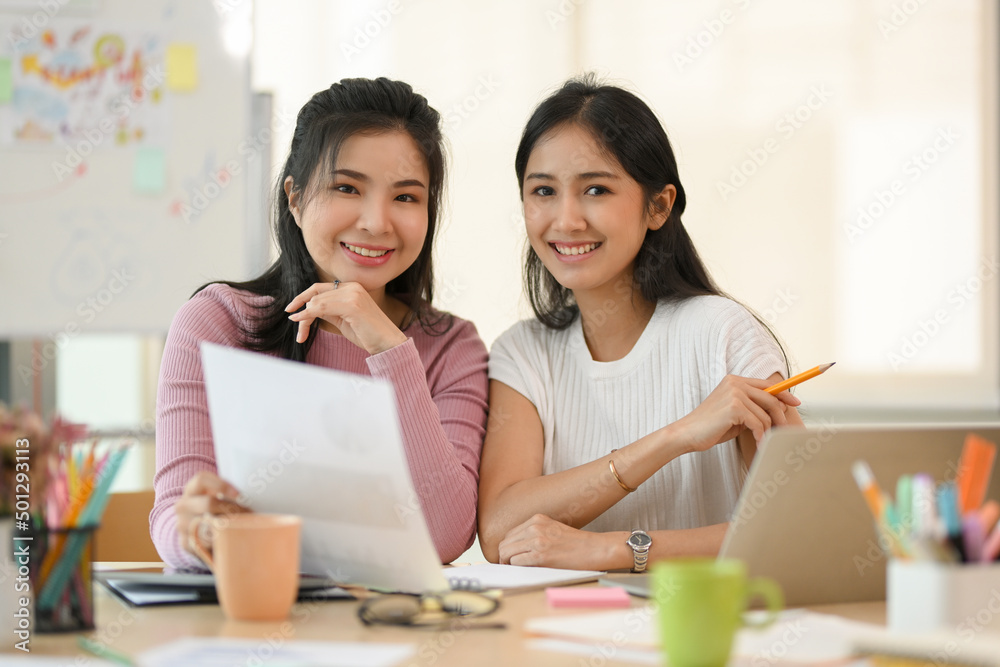 Portrait of a Happy and cheerful Asian young female college students Portrait of a Happy and cheerful Asian young female college students