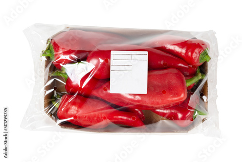 Packed and labeled capia pepper on an isolated white background photo