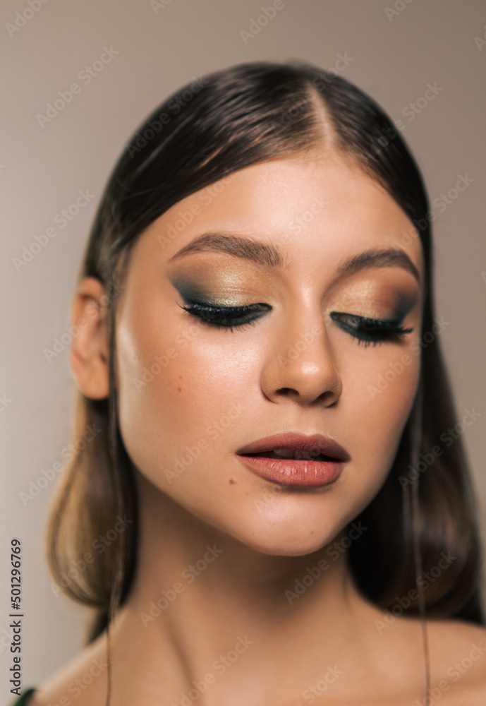 Fototapeta premium Beauty portrait of a beautiful girl with a smoky eye