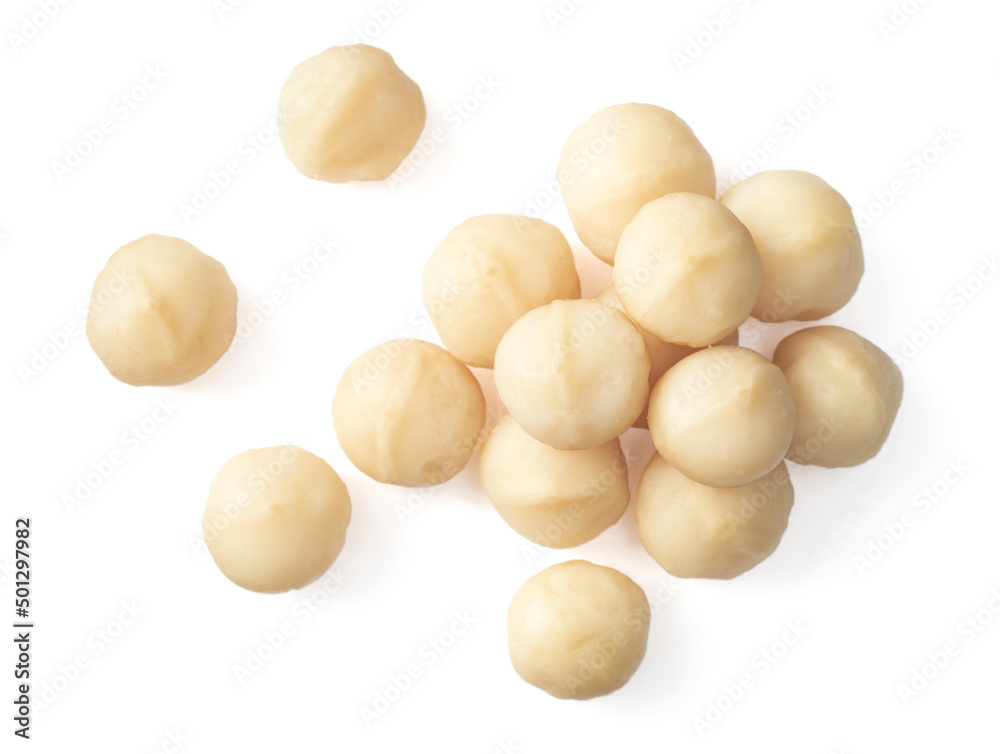 Shelled Macadamia nuts isolated on white background, top view.