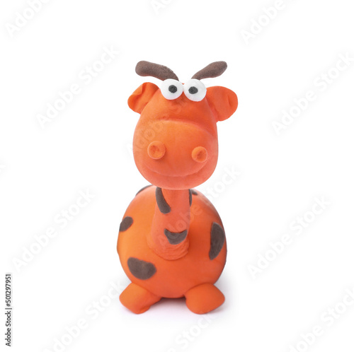 Small giraffe made from play dough on white background