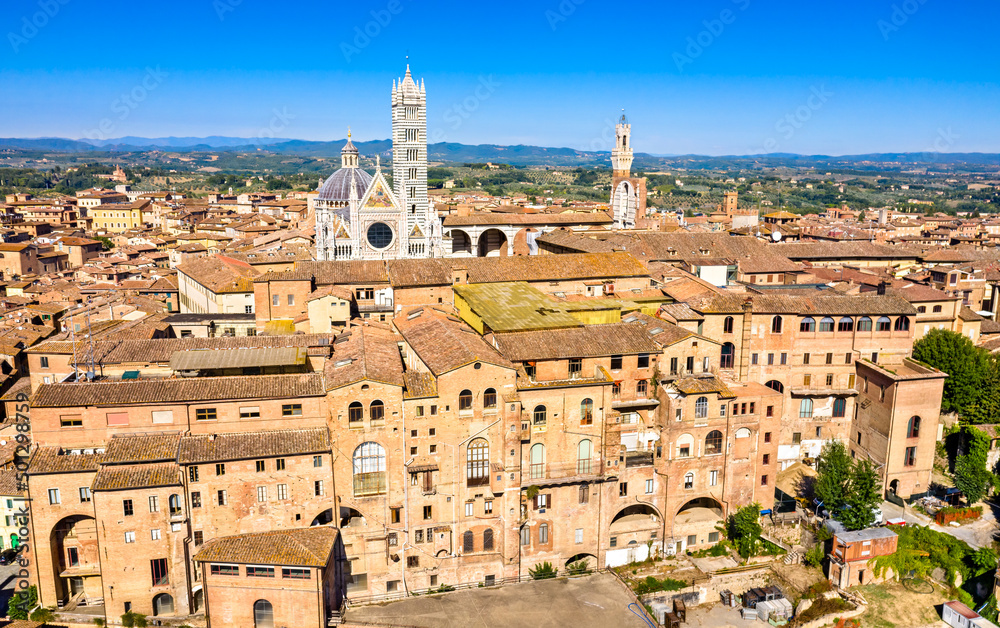Aerial view of Siena with the Cathedral and the Mangia Tower. UNESCO world heritage in Tuscany, Italy