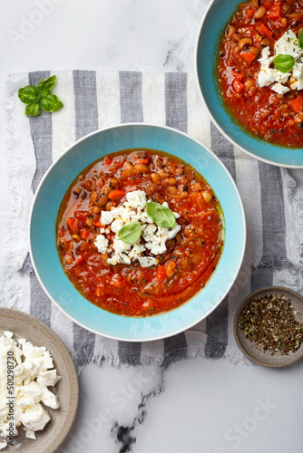 fasolada Greek soup with white beans and vegetables photo