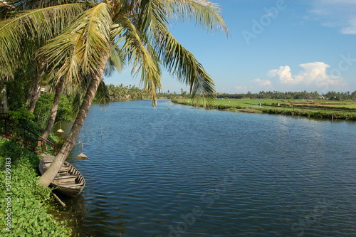 Fototapeta Naklejka Na Ścianę i Meble -  boat on the river bank in vietnam landscape view