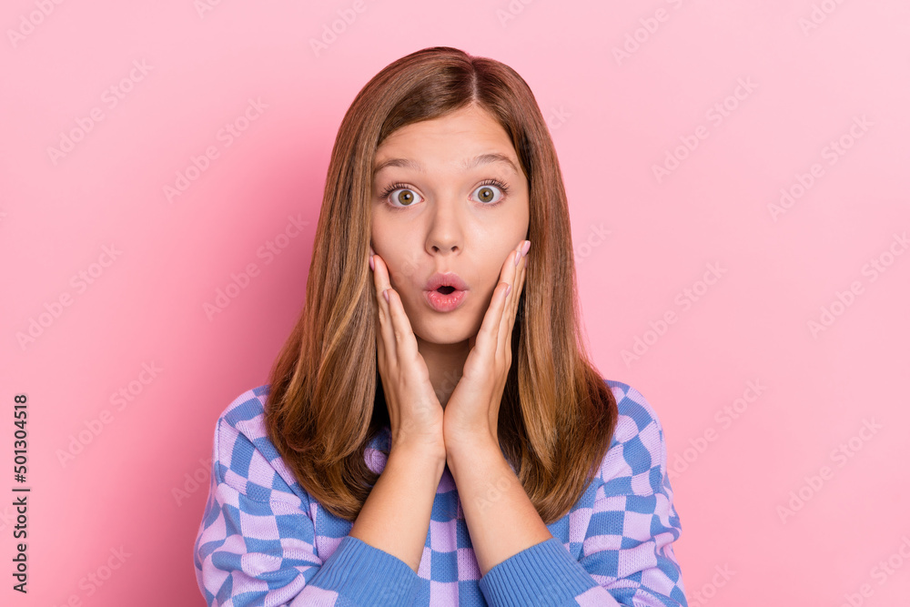 Photo of brown hairdo impressed little girl hands face wear blue sweater isolated on pink color background