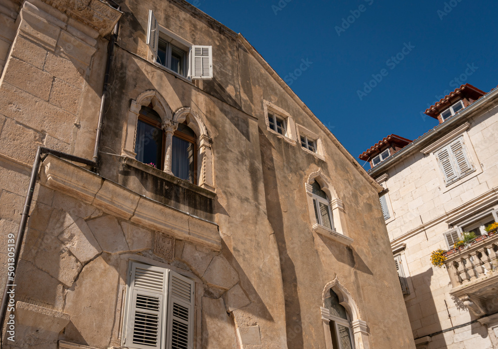 Building facade in the Diocletian's Palace in the ancient city of Split, Croatia