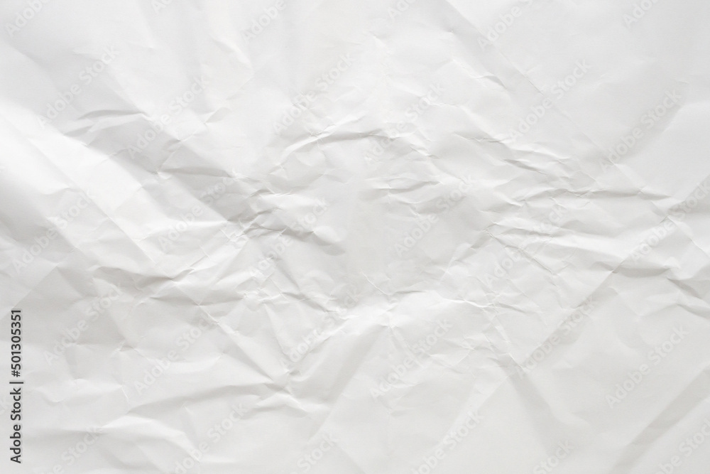White crumpled and creased paper texture background White crumpled and creased paper texture background