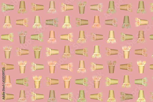 Abstract pattern from multi coloured  paper drinking cups  wooden fork and spoon. Arranged Diagonally on rose pink background. Ideal wallpaper   background   banner etc.  