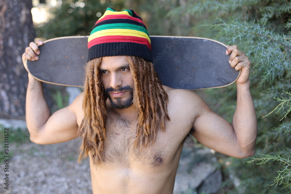 Shirtless skater with a great look Stock Photo Adobe Stock