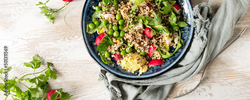 plate of quinoa with vegetables on the table