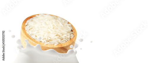 Rice milk, The movement of Thai Jasmine rice in wooden bowl falling into dairy splashed, Isolated on white background, Ketogenic diet or Healthy drink lactose free for Health care and Beauty concept.