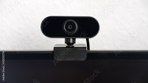 Close-up of webcam clamped on monitor