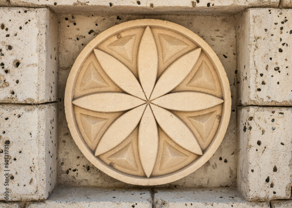 Ornamental architectural rosette on a wall