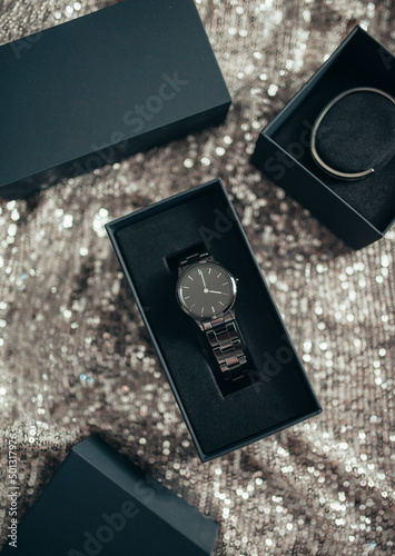 Stylish classic black watch and silver bracelet in gift boxes