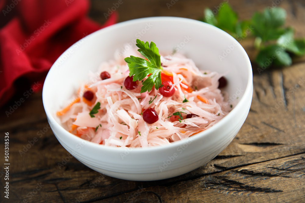 Traditional homemade sauerkraut with cranberry Traditional homemade sauerkraut with cranberry