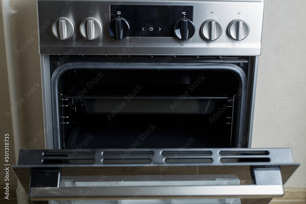 modern gas oven front view. Open oven. Steel gas oven. modern kitchen equipment.